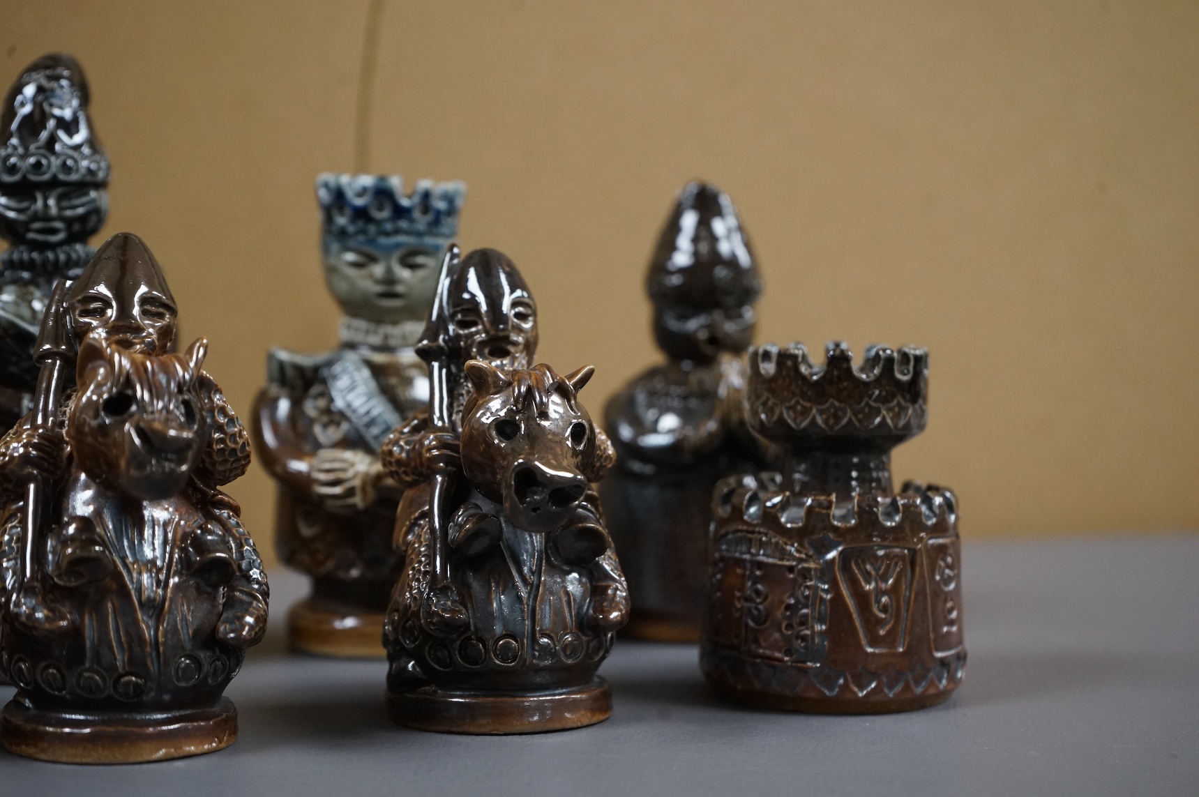 Guy Sydenham (1916-2005), a set of 16 black side chess pieces, tallest 11cm